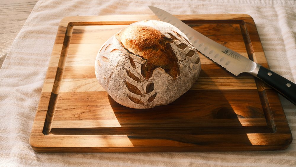 Signature country sourdough with hand-scored leaf pattern